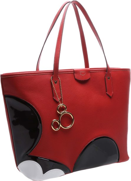 E uma bolsa vermelha para quem gosta de objetos que chamem atenção. Parece que um Mickey passou por ali.