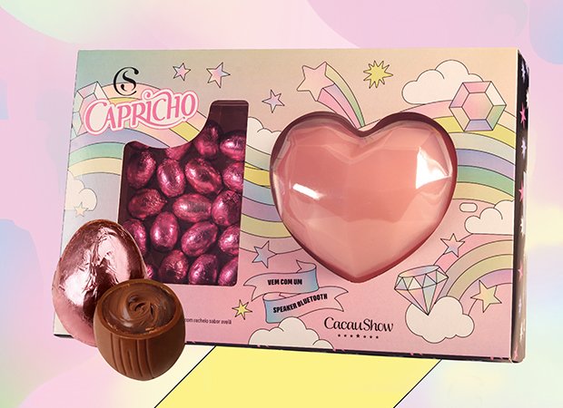 Kit Páscoa da CAPRICHO com a Cacau Show vem com ovinhos sabor avelã (180g) e uma speaker em formato de coração (R$ 74,90*) Kit Páscoa da CAPRICHO com a Cacau Show vem com ovinhos sabor avelã (180g) e uma speaker em formato de coração (R$ 74,90*)
