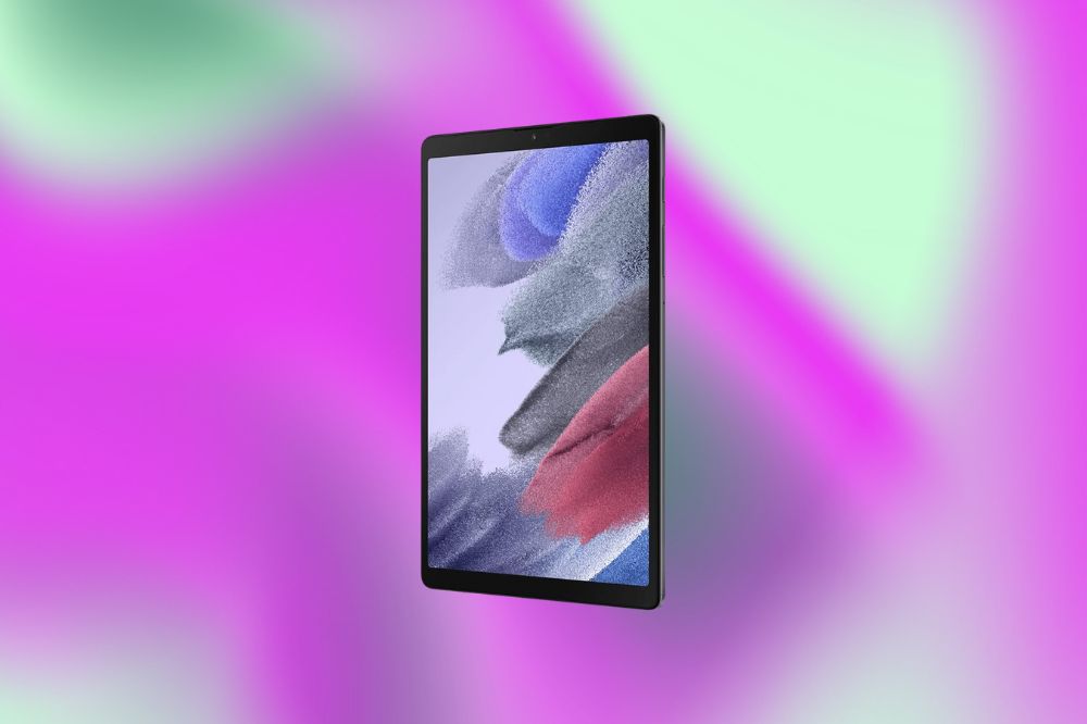 Imagem de um tablet cinza em um fundo roxo e verde.