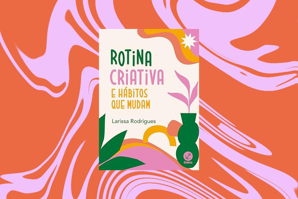 Imagem de um livro bege com flores e desenhos coloridos em um fundo rosa e laranja.